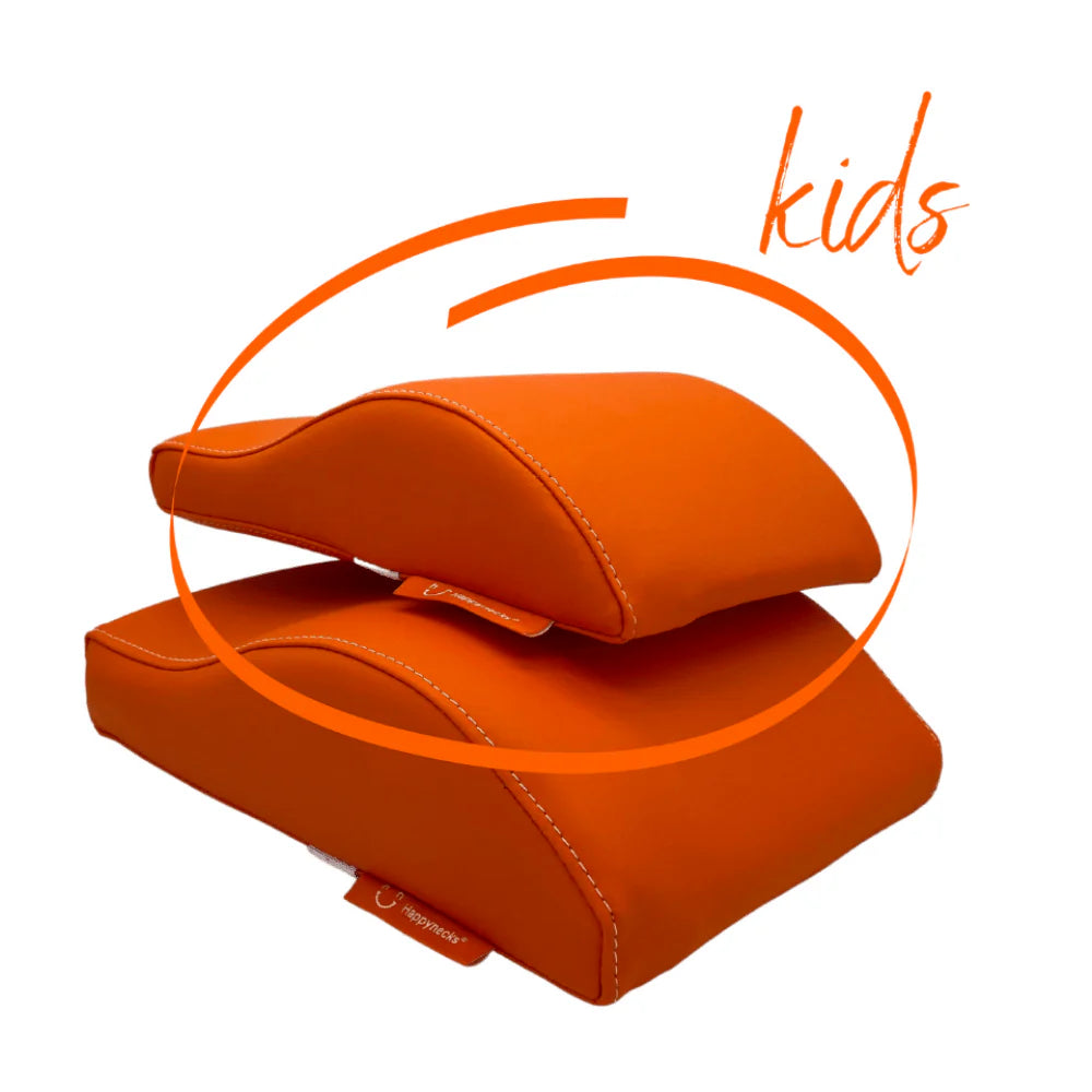 A vibrant orange ergonomic cushion for children, offering both comfort and cheerful color. Over white background. 