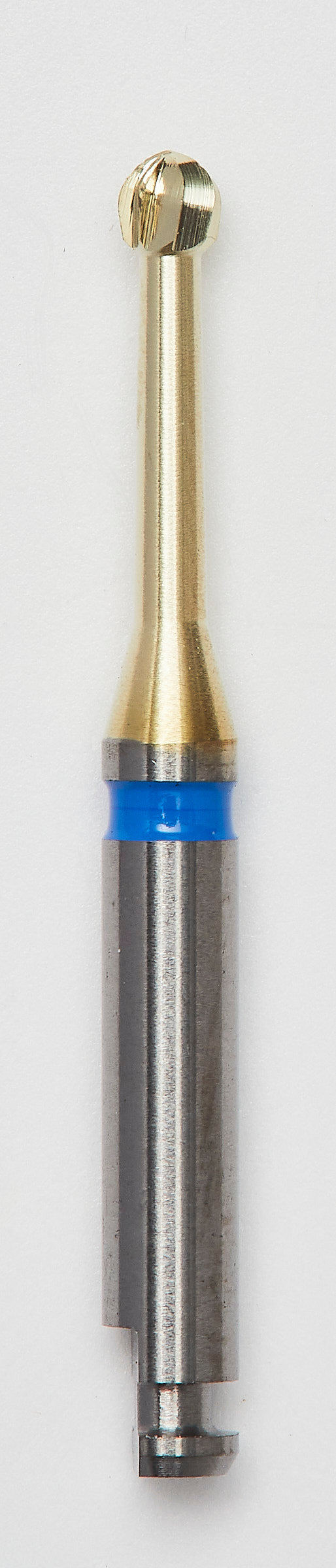 A BLUE CUT Carbide Round Bur 018 with a zircon nitrite wear protection layer, featuring a gold-colored precision blade, designed for durability and efficient dental procedures.